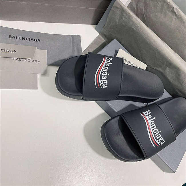 BALENCIAGA Black Logo Wavy Pool Slides - 1